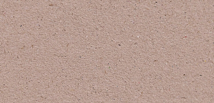 Recycled paper texture in dusty rose, grainy kraft paper background with natural fibers, organic pink cardboard surface for eco-friendly branding