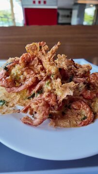 Traditional Indonesian Food Fried Shrimp Croquettes, Beef Stew and Coconut Urap