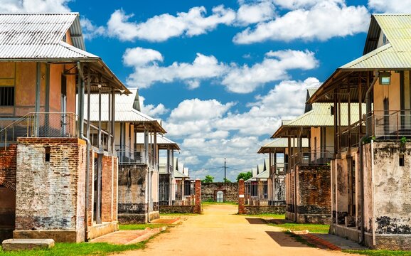 The Transportation Camp in Saint-Laurent-du-Maroni, French Guiana, a former penal colony with decaying prison buildings, and aged brick walls, preserving the history of exile and forced labor