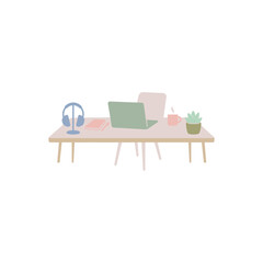 Fototapeta premium Desk setup featuring a laptop, headphones, and a small potted plant provides a clean and modern workspace for professionals working from home.
