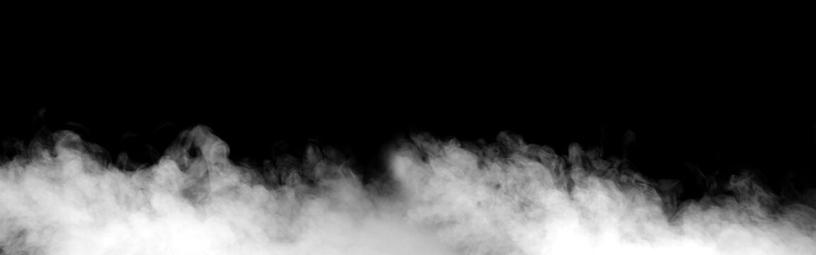 White fog and smoke rising from the bottom on a black background, creating an atmospheric mist texture ideal for visual effects, cinematic scenes, overlays, graphic design.