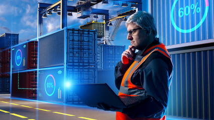 Smart logistics, Container tracking. Port operator monitors shipping containers with laptop and digital cargo data at automated terminal yard. © Grispb
