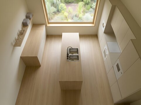 Modern minimalist kitchen with natural light and garden view from skylight window