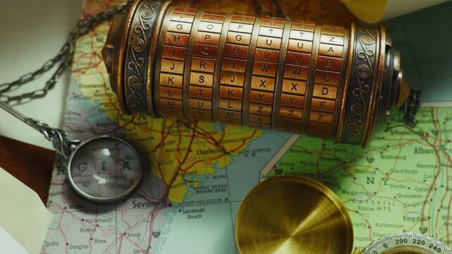 High angle close-up of a cryptex on a map with tools, suggesting exploration, clue analysis, and adventure-driven discovery.