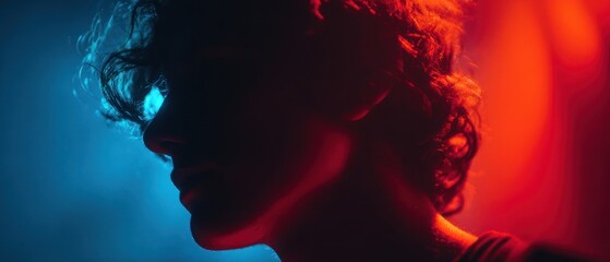 Fototapeta premium Profile of a person in moody lighting