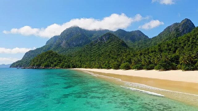 Scenic Beach with Clear Turquoise Water and Mountain Backdrop.