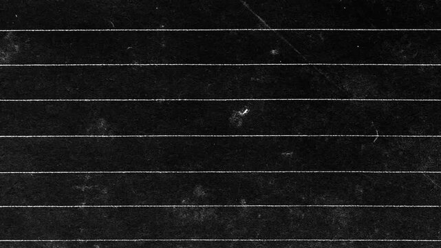 Vintage Black Lined Paper.Dark grunge textured background loop with dust and scratches.Video effect for video editing.