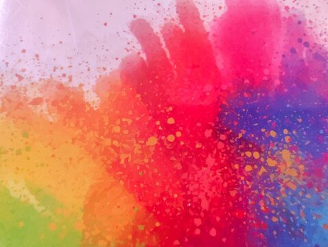 A colorful abstract artwork featuring vibrant rainbow powder splatters and watercolor textures blending together on a light canvas