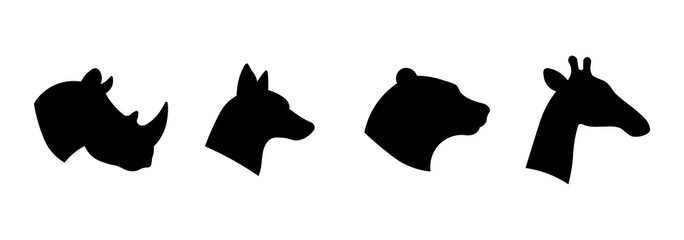 Wild animal head icons set, safari animal silhouettes pack, wildlife icons collection in flat style. © Adit