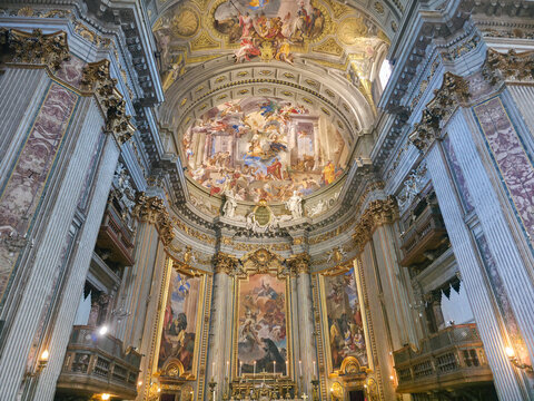 Interior of Sant Ignazio Church in Rome, Italy. Majestic baroque main altar and spectacular frescoed apse by Andrea Pozzo, historic catholic basilica architecture