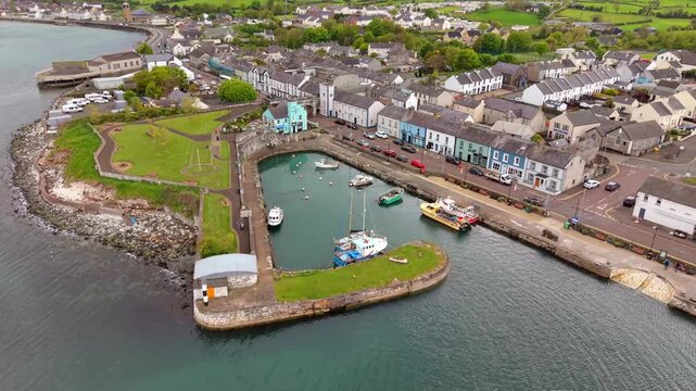 4K 60FPS aerial video of Carnlough in County Antrim, Northern Ireland in the UK. Produced in 3840x2160 and with Rec709 color.