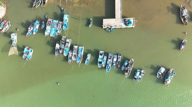 Nam Trach, Quang Binh (Quang Tri), Vietnam &ndash; 4K aerial drone footage of river mouth, East Sea, sandy beach, fishing village, boats, beachfront roads and seaside landscape near Dong Hoi City