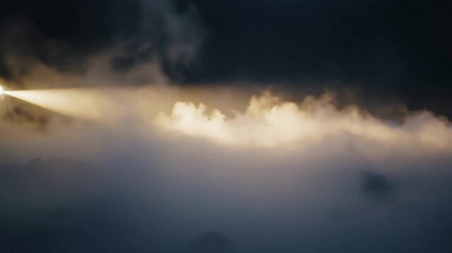 Golden light pierces through dark, turbulent clouds, creating a dramatic and hopeful pathway in a mysterious sky, symbolizing clarity amidst uncertainty and illuminating an unseen journey ahead