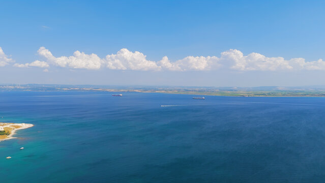 Seddulbahir, Eceabat, Turkey. Aerial panorama of Dardanelles Strait with ships sailing between Aegean Sea and Marmara Sea at Cape Helles. Clear day maritime view. Aerial view.. Aerial View