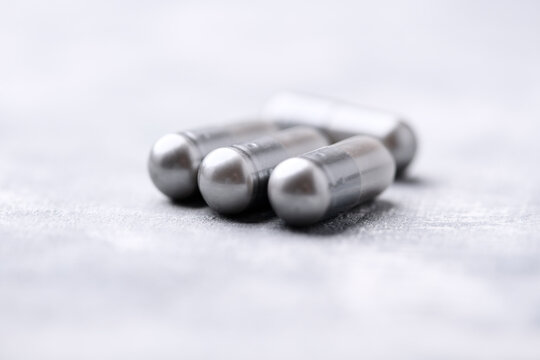 BCAA amino acids tablets. Nutrition for bodybuilding. Fitness supplements on bright background. Soft focus. Copy space.