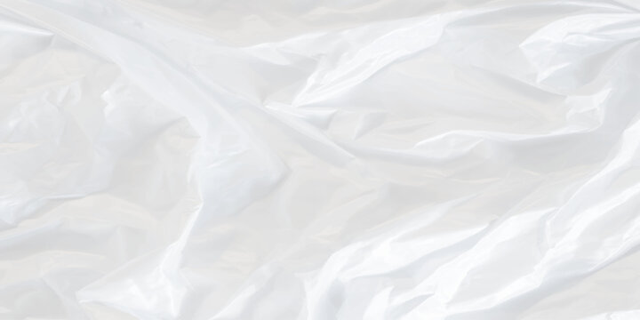 Crumpled white plastic sheet texture background with creases and folds