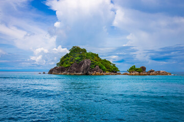 Naklejka premium A small island in the middle of the sea for snorkeling at Koh Chang, Thailand.