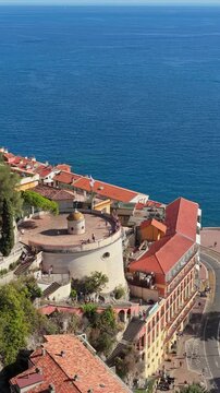 Aerial view of bell tower overlooking Mediterranean sea in Nice France.