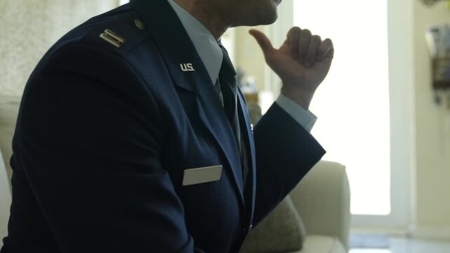 U.S. Air Force Officer sitting in Dress Uniform With Pilot Wings and Service Ribbon Closeup