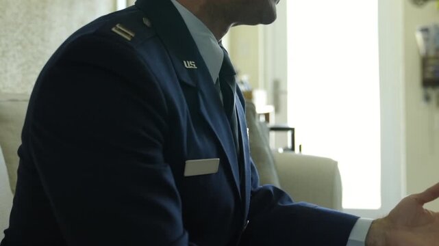 U.S. Air Force Officer sitting in Dress Uniform With Pilot Wings and Service Ribbon Closeup