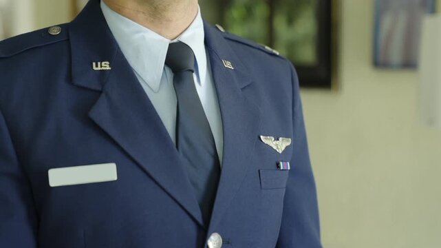 U.S. Air Force Officer in Dress Uniform With Pilot Wings and Service Ribbon Closeup
