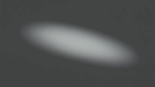 Soft Oval Shadow Drifting Diagonally with Very Low Opacity: Minimal Cinematic Abstract Motion Loop (16:9)