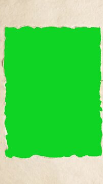 Vertical vintage book page center torn hole gap revealing animated on a green screen chroma key background. It gives a high quality professional template design element for video compositing