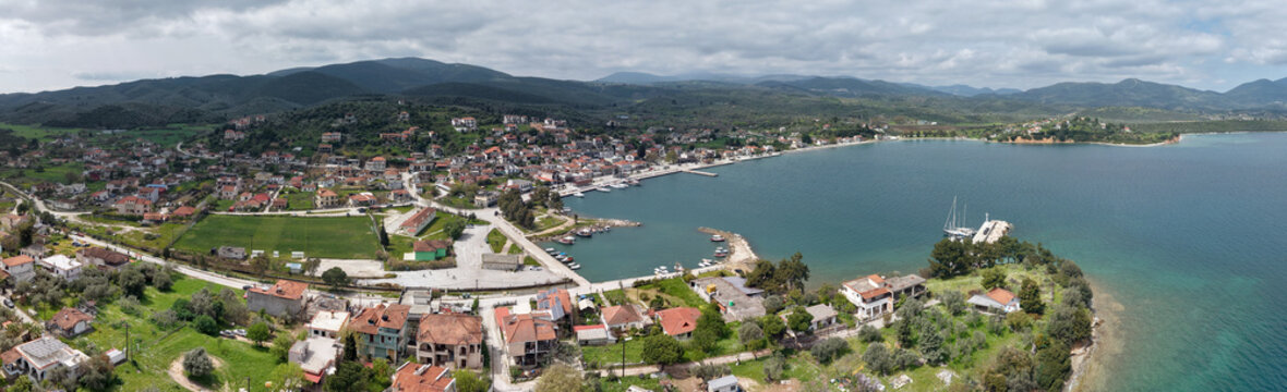 Wide aerial panorama of Achilleio village and port in Magnesia, Greece