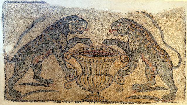 Ancient Roman mosaic depicting two panthers drinking from a wine crater vase