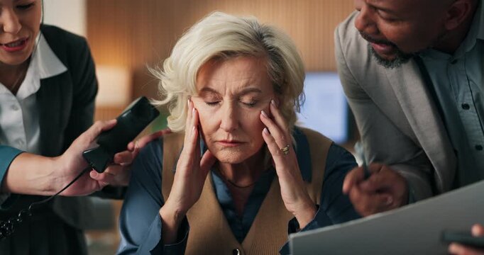Multi tasking, stress and business people with documents in office with chaos for finance project deadline. Workload, headache and mature financial manager with fatigue for colleagues in workplace.