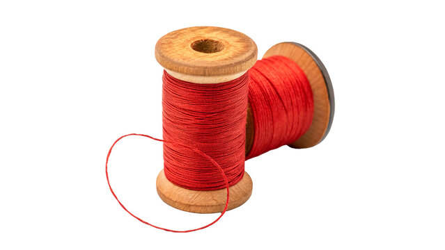 A vintage wooden sewing spool roll filled with bright red textile thread isolated on transparent background