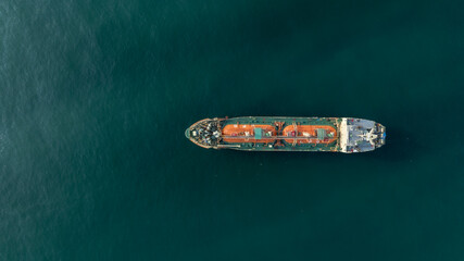 Drone shot of oil tanker vessel, energy and logistics concept. © Nutchanart