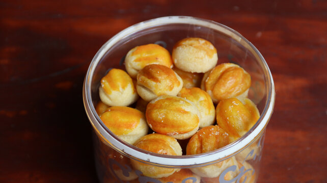Nastar Cookies, Pineapple tarts or nanas tart are small, bite-size pastries filled or topped with pineapple jam, commonly found when Hari Raya or Eid Al Fitr or Lebaran. Selective focus