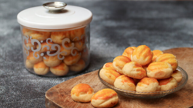 Nastar Cookies, Pineapple tarts or nanas tart are small, bite-size pastries filled or topped with pineapple jam, commonly found when Hari Raya or Eid Al Fitr or Lebaran. Selective focus