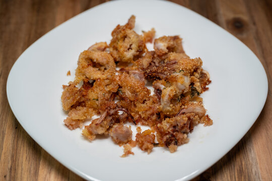Tasty and light baked squid au gratin
