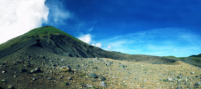 Volcanology. Maar. Volcanic mountains, parasitic crater, embryonic volcano, desert covered with pyroclastic material, effusive rock