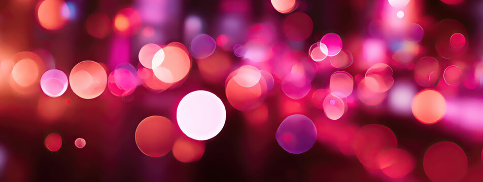 Soft focus background with vibrant pink, purple, and red circular lights