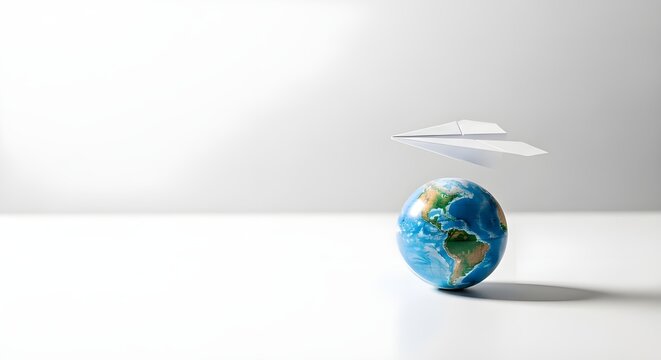 Paper Airplane Flying Above Earth Globe &ndash; Global Education and Travel Concept