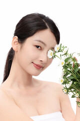 Fototapeta premium Beautiful Woman Holding White Daisy Flowers Near Face