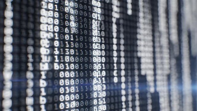 Closeup of binary code on screen representing smart infrastructure and data-driven solutions