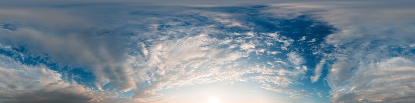 Sky panorama sunset 360 degree equirectangular view of wispy cirrus clouds in a blue sky for 3d visualization and mapping
