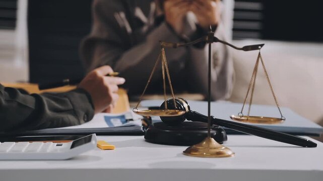 Lawyer explained to the client about the law that must be brought against the court case.