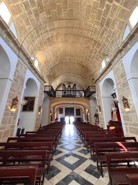 interior of the catholic church Parroquia De Santa Catalina Casa Parroquial in the old town of Conil de la Frontera, Cadiz, Andalusia, Spain