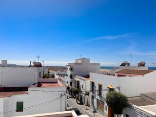 Fototapeta premium view over the roofs of the old town of Conil de la Frontera, Costa de la Luz, Andalusia, Spain