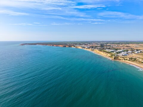 aerial view of the cliffs at the beach of Fuente del Gallo near Conil de la Frontera next to the Playa de la Fontanilla, Cadiz, Andalusia, Costa de la Luz, Spain
