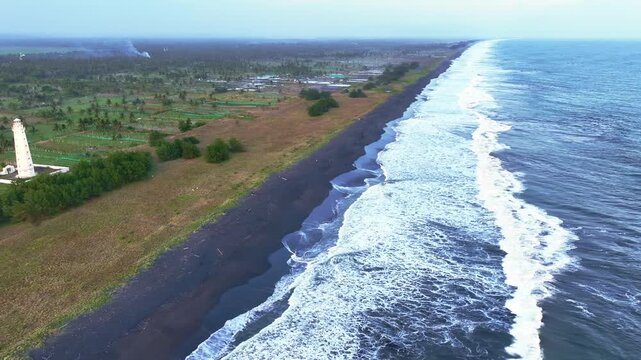Aerial view of long beach and surf