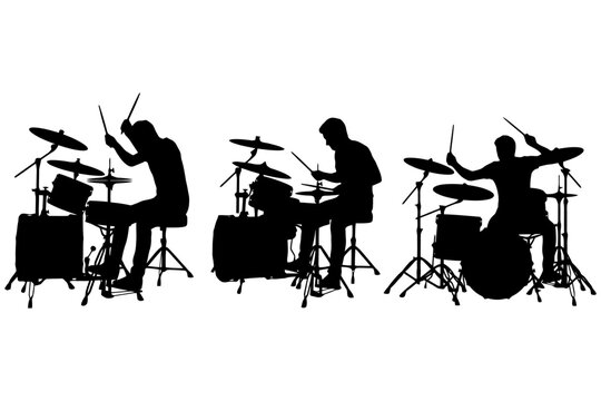 Silhouette of three male drummers playing drum sets.
