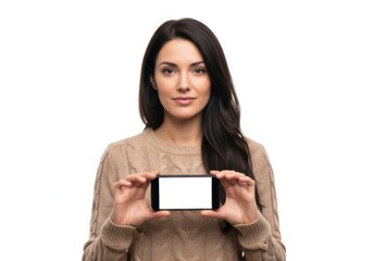 Fototapeta premium Woman holding smartphone with neutral expression
