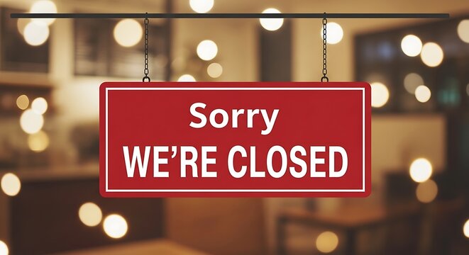Prominent Red Sorry We Are Closed Business Sign in Cafe Window