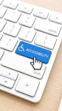 Close-up of computer keyboard with finger clicking accessibility button, symbolizing inclusive technology and equal access for people with disabilities in digital world.
